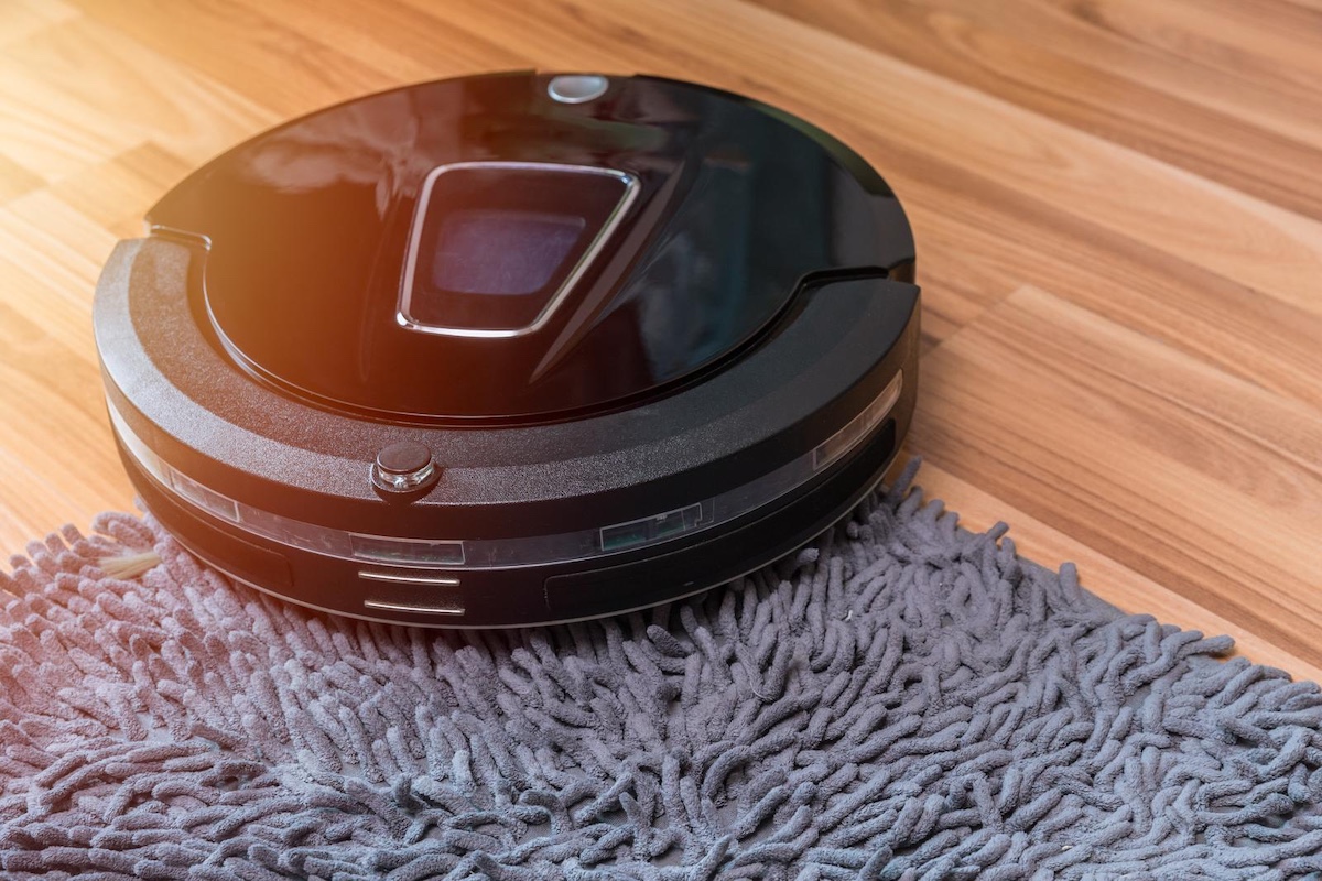 best robot vacuum for thick carpet cleaning the floor with doormat