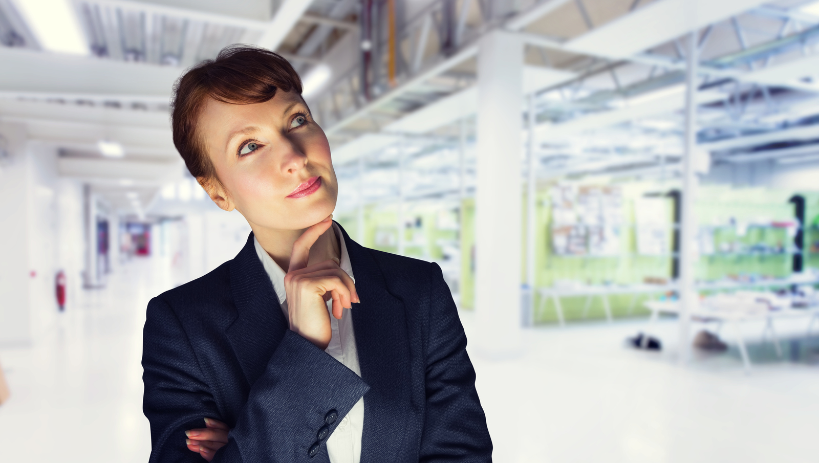 composite image of thinking businesswoman