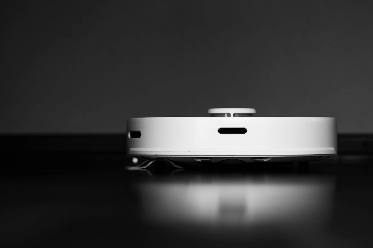 smart robot vacuum cleaner on wood floor